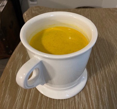 White mug with turmeric chai